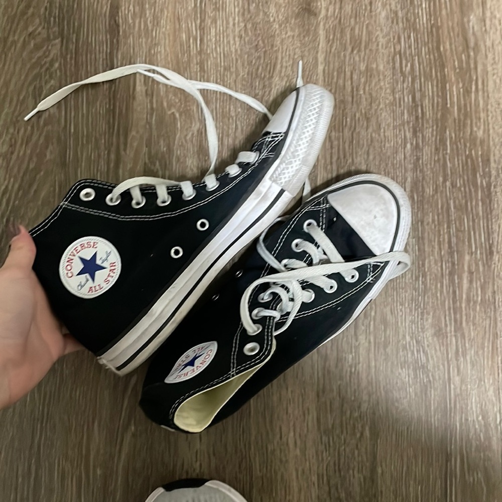 Black high top sneakers